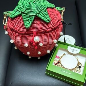 Kate Spade strawberry 🍓 purse and charm bracelet